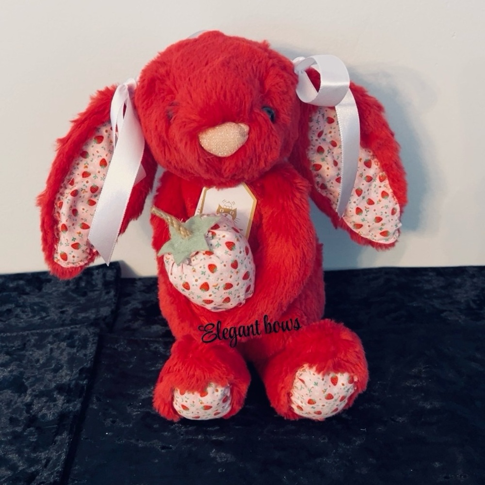 Jellycat custom made into a strawberry 🍓 bunny with white satin bows in ears